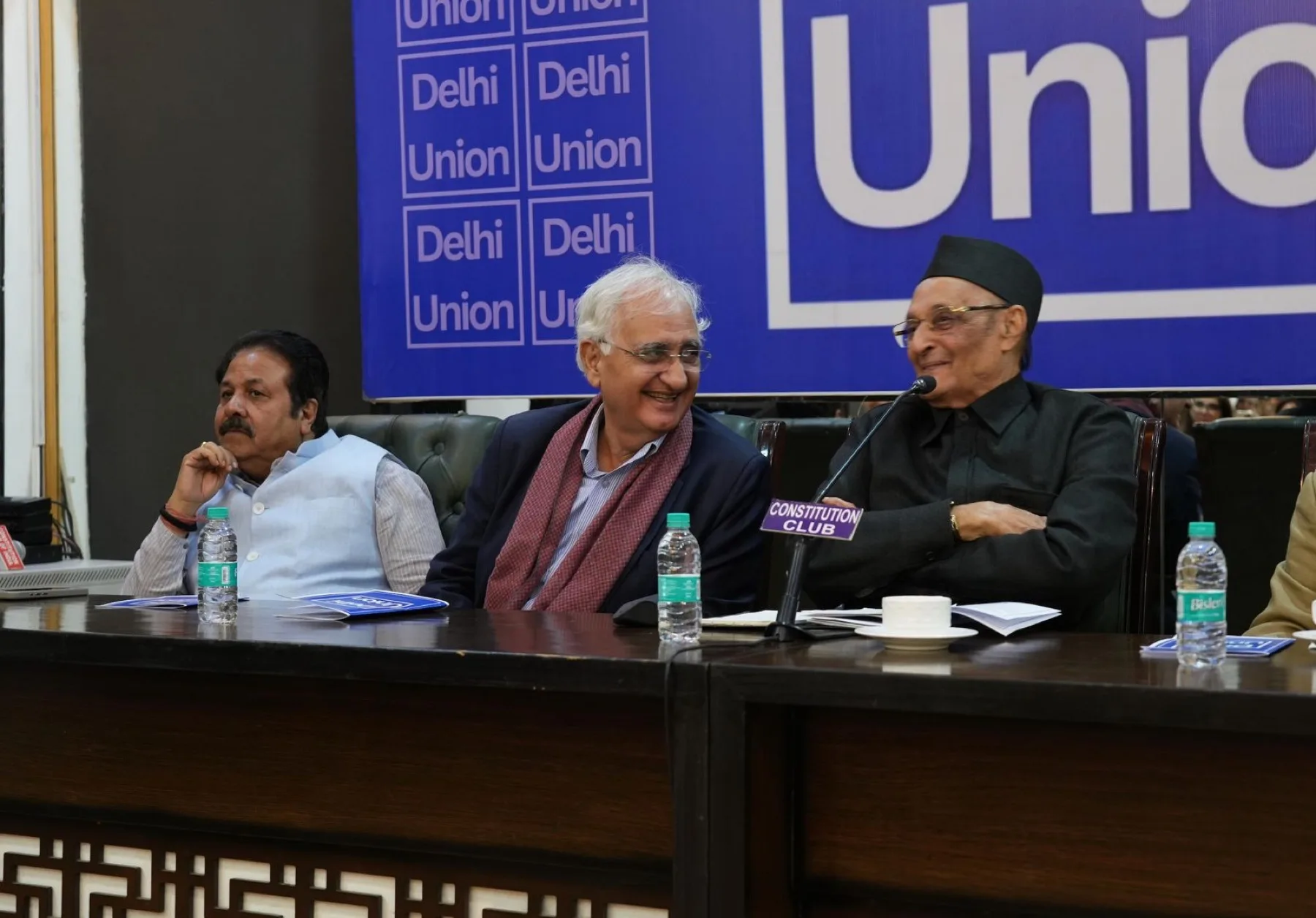 Salman Khurshid and Dr Karan Singh share a laugh on the front bench